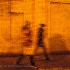 Couple Walking with Red Light
