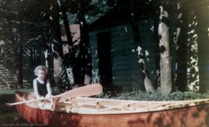 In canoe, about age 3.